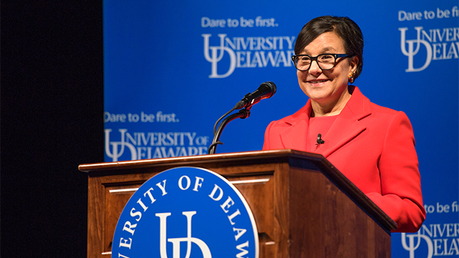 Penny Pritzker at a podium